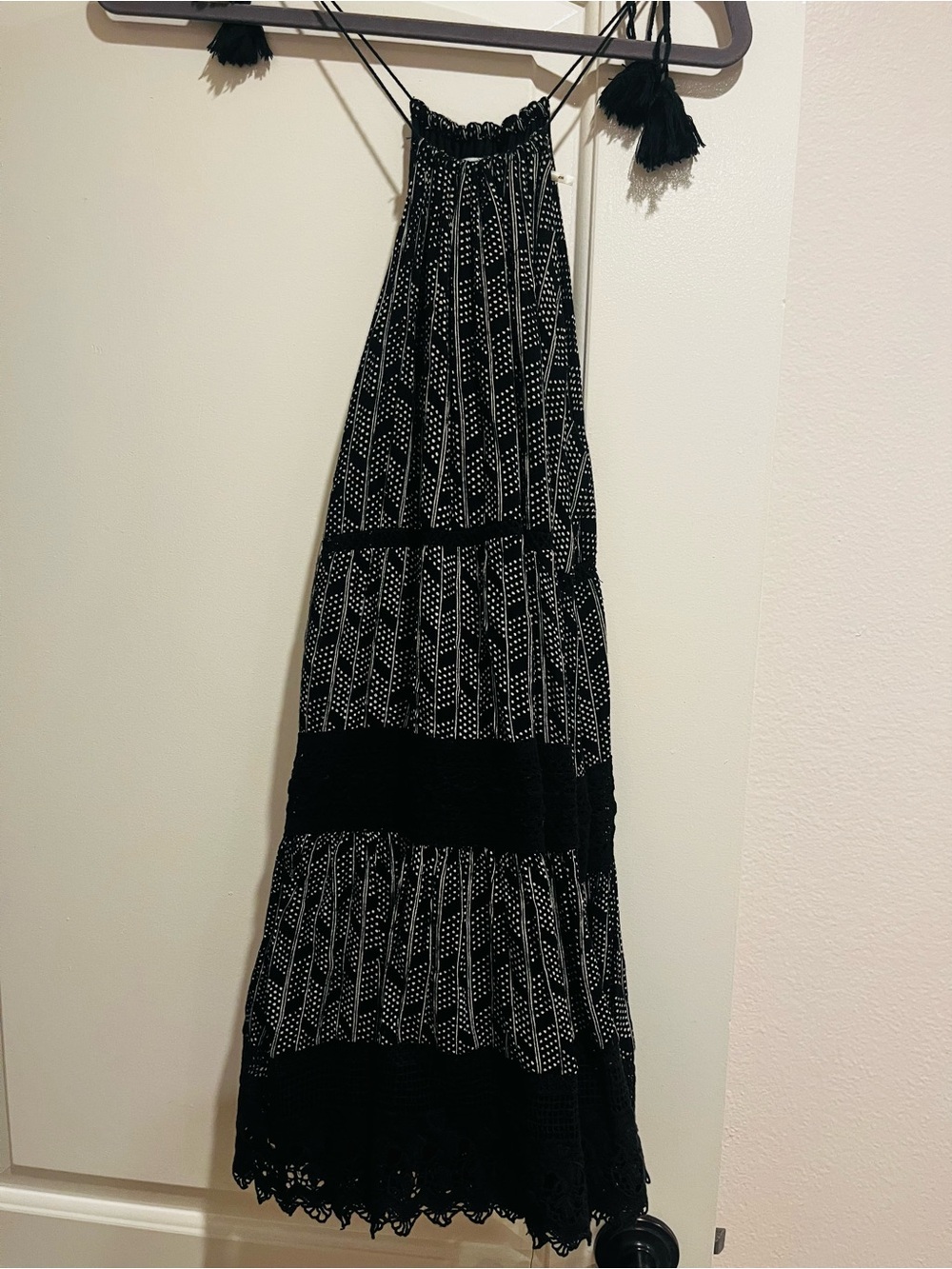 Bundle of dresses one is Black and White Patterned and other one wrapp dress